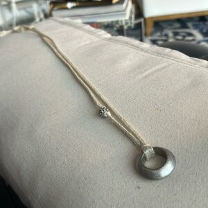 Necklace with circular ornament